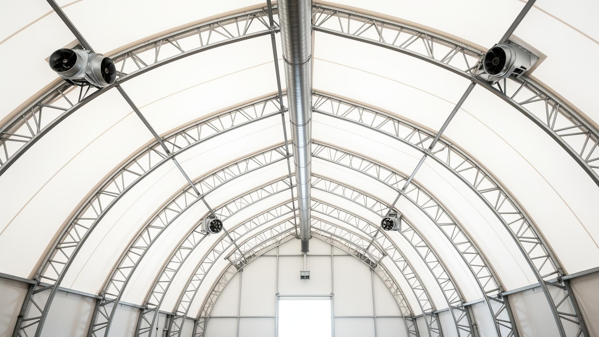 Interior view of a Building Depot dome showing ridge ventilation and exhaust fans