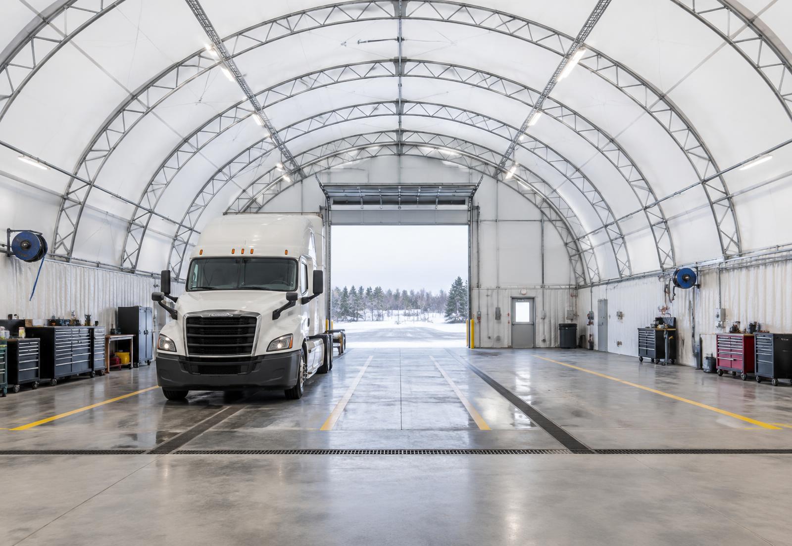 Interior of a fabric building sized for fleet and equipment access